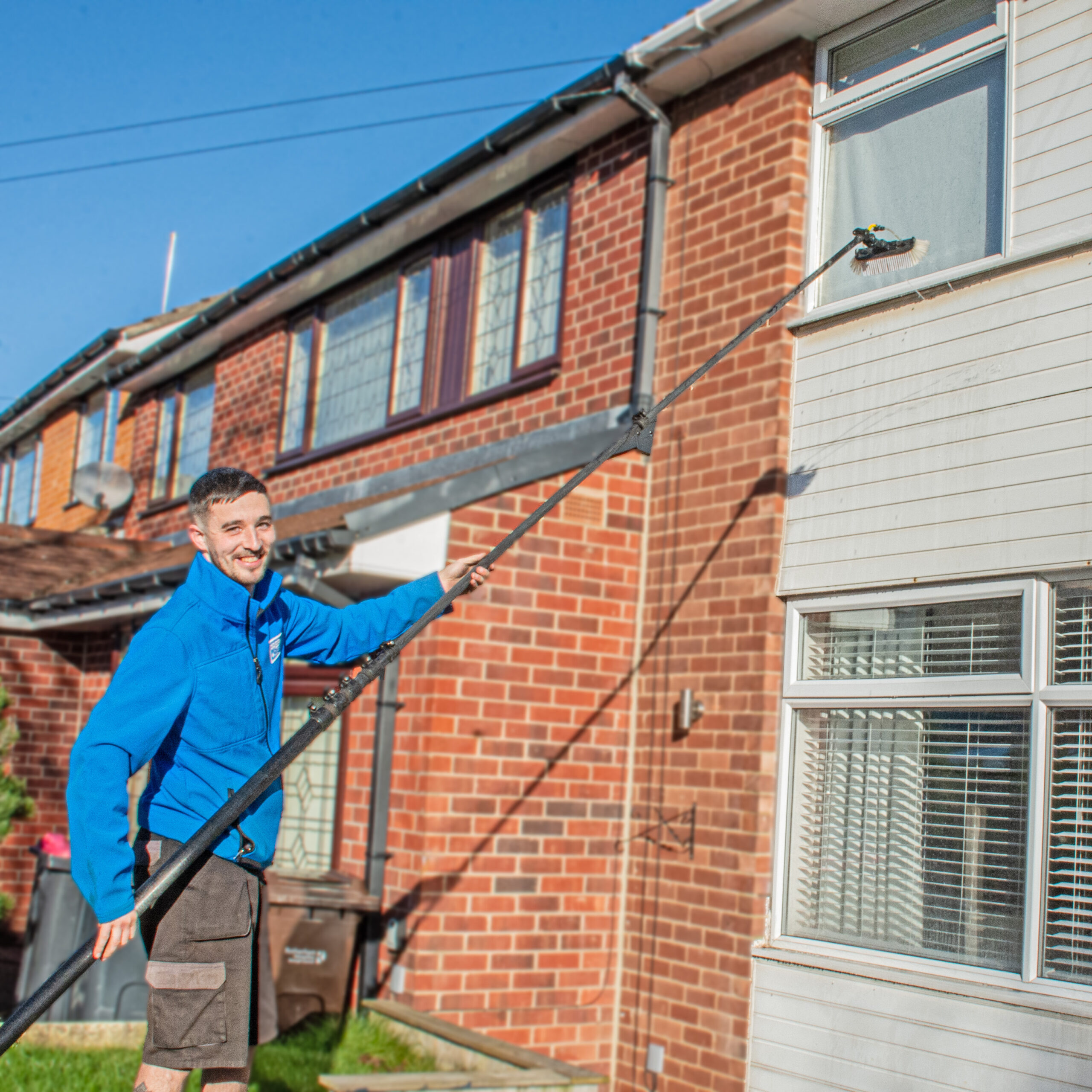 Fascia Cleaning by one of our technicians